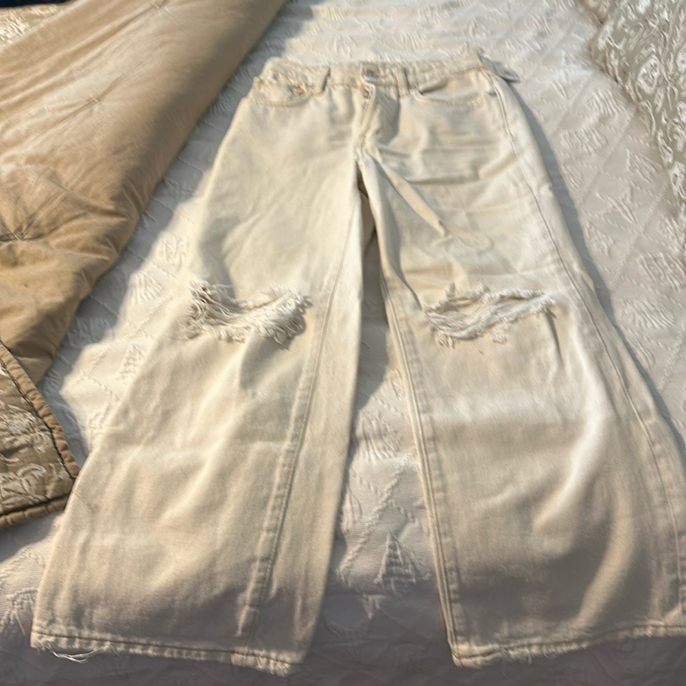 NWT Distressed cream jeans